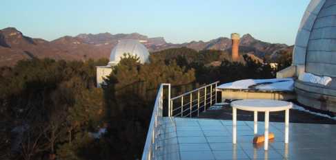 Another view of the observatory platform of Jin's observatory. Note the flat roof and the dome at right. Visual observers were located at this side of the roof, the technical equipment is located at the right outside this picture.