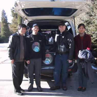 Expedition members Michel VandePutte and Robert Haas and their Chinese students leave Xinglong station to setup the second station at PanShan.